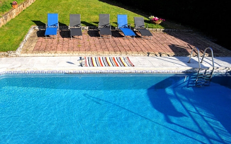 Private pool with lawn is just above the house